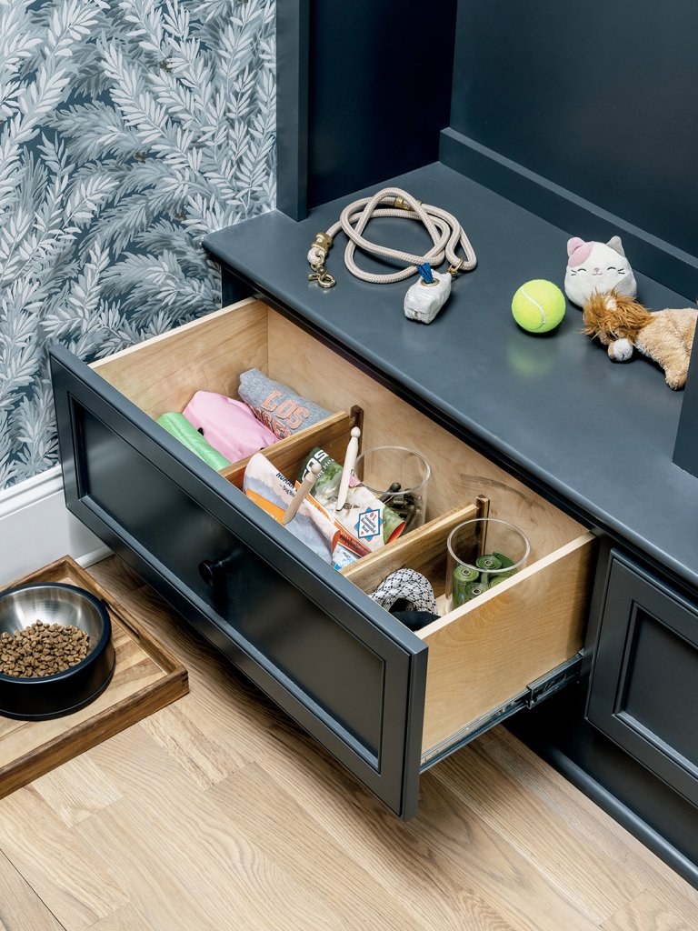 Entryway drawer organizing daily dog walking supplies